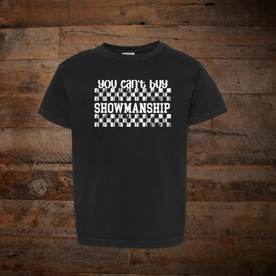 Black t-shirt with 'you can't buy showmanship' text and checkerboard pattern