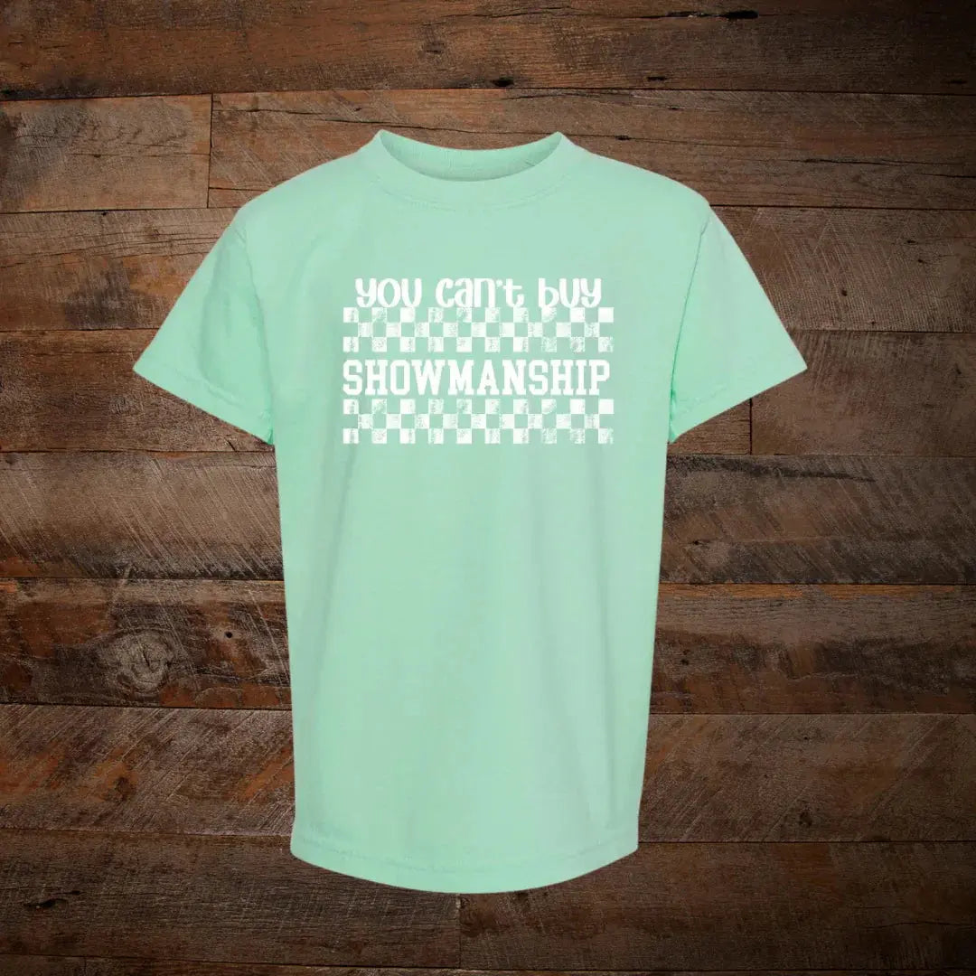 Mint green t-shirt with 'you can't buy showmanship' text and checkered pattern