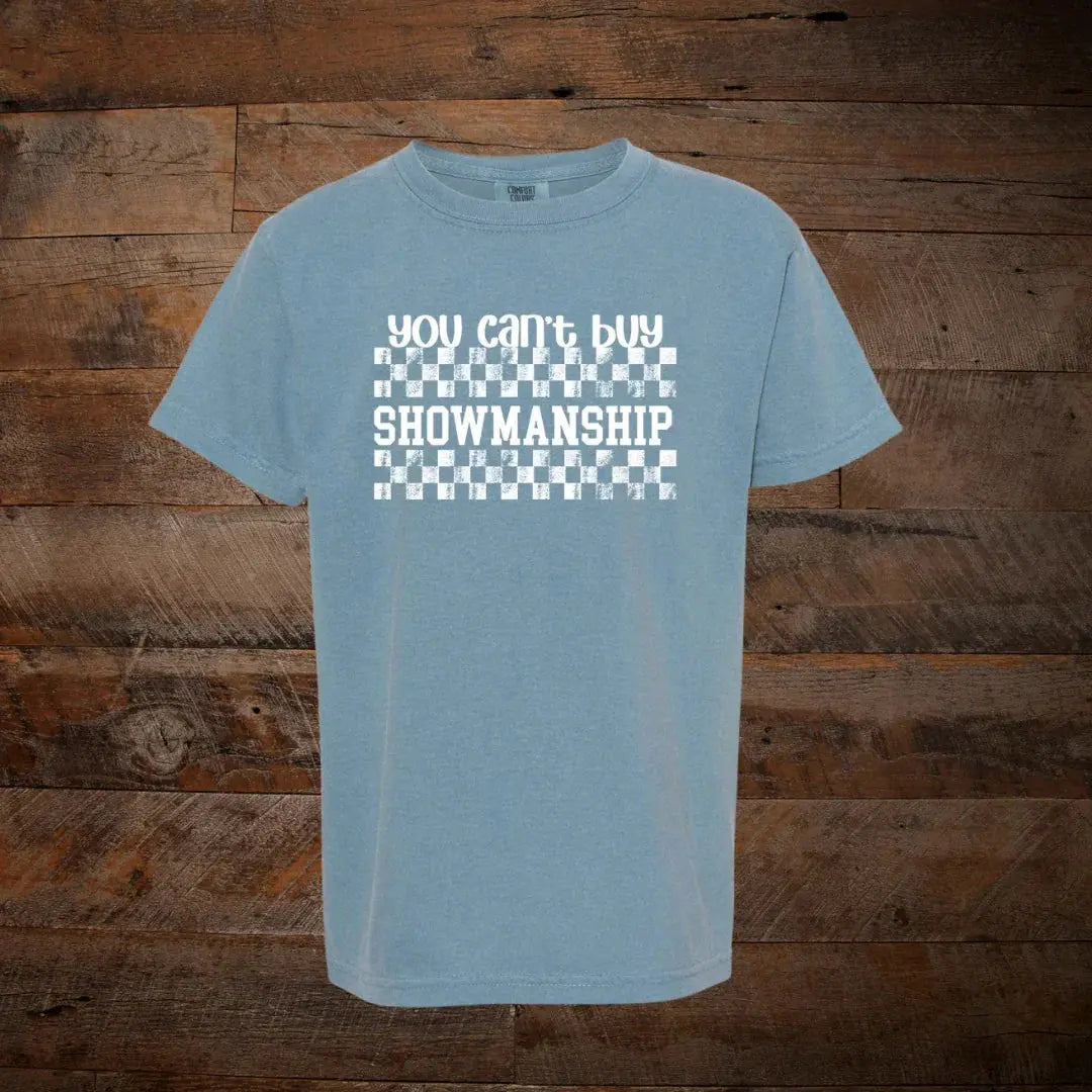 Blue graphic t-shirt with 'You can't buy showmanship' text and rustic checkerboard pattern