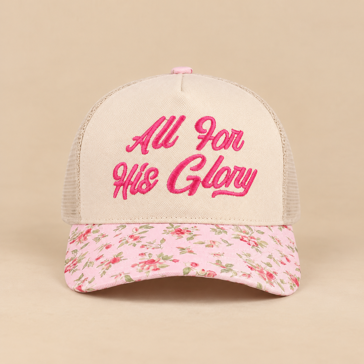 All For His Glory floral snapback hat with pink embroidery on warm beige background