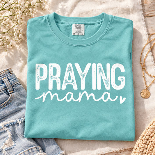 Praying Mama tee in chalky mint styled flat lay
