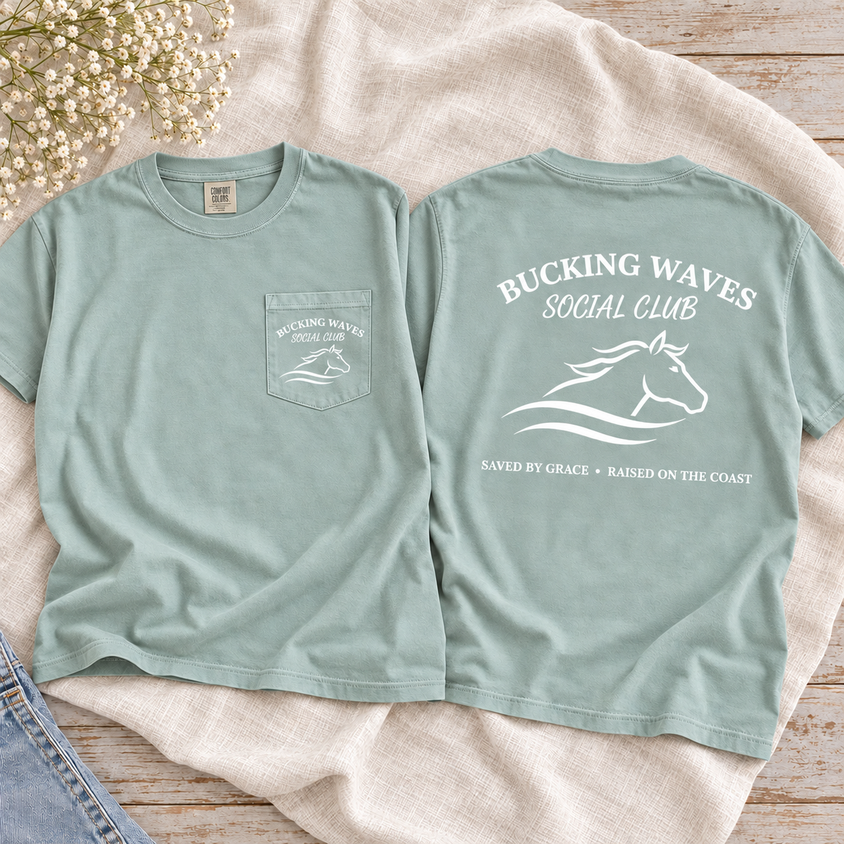 Bucking Waves Social Club Bay tee front pocket and back flatlay