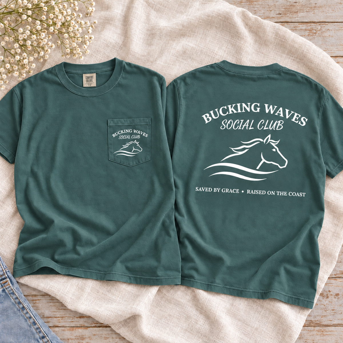 Bucking Waves Social Club Blue Spruce tee front pocket and back flatlay