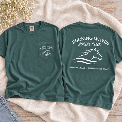 Bucking Waves Social Club Blue Spruce tee front pocket and back flatlay