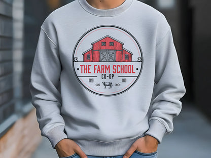 Sport grey sweatshirt with The Farm School Co-Op barn graphic, worn by male model